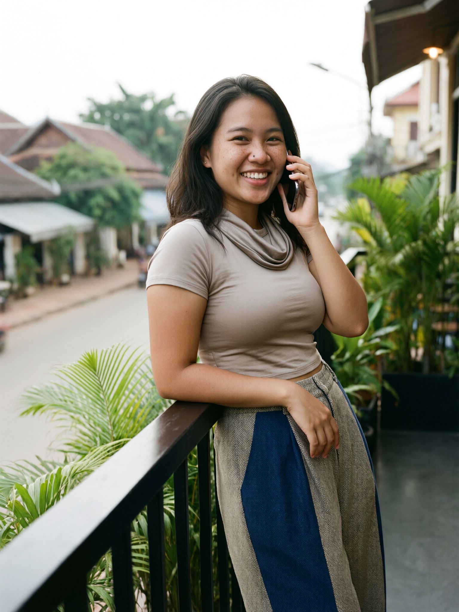A measured glance on a Vientiane café terrace
