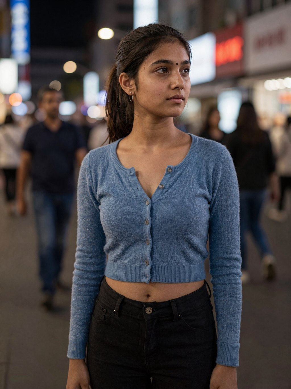 Quiet side glance amid blurred city lights