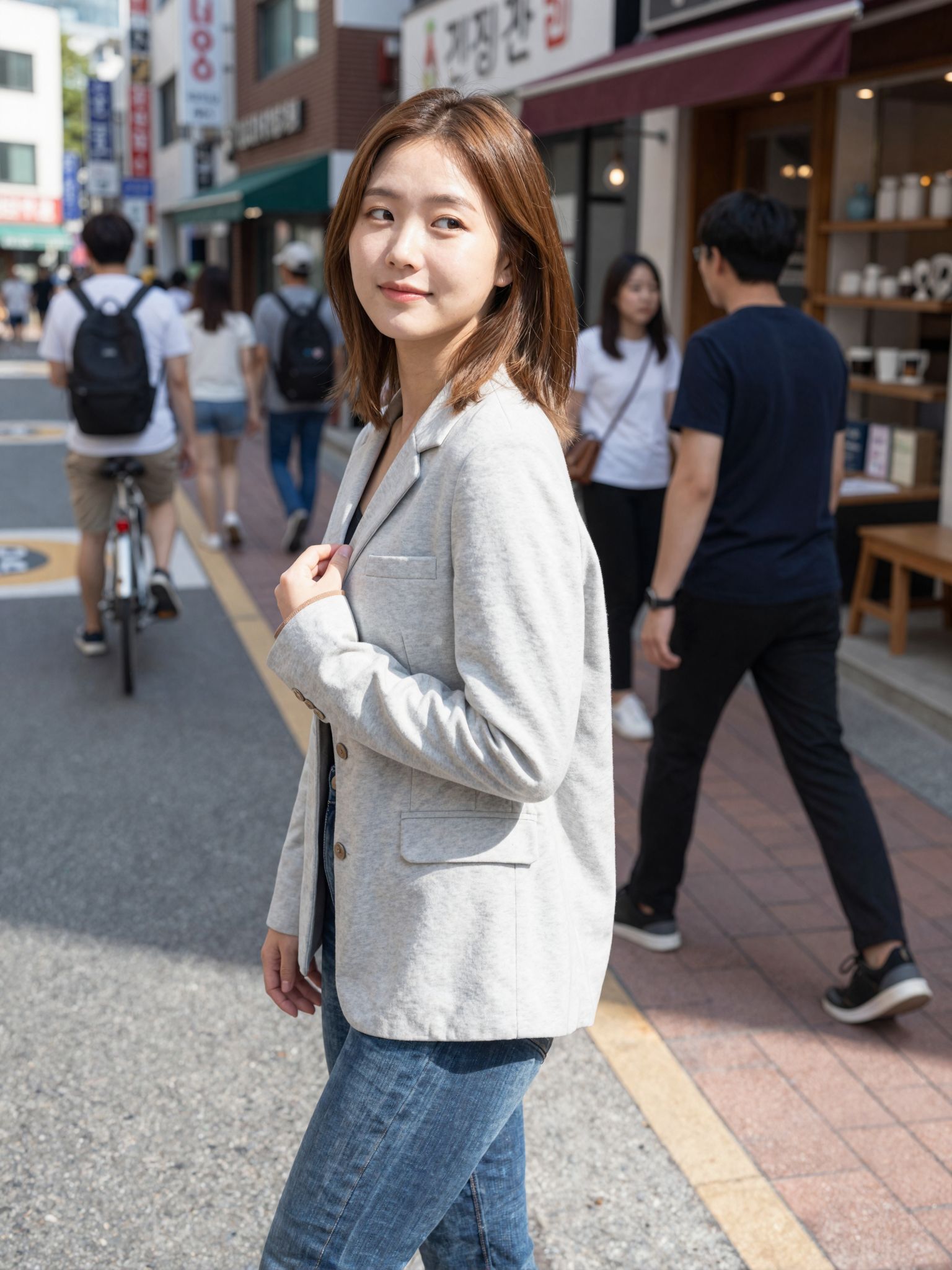 A soft glance over the shoulder on a busy street