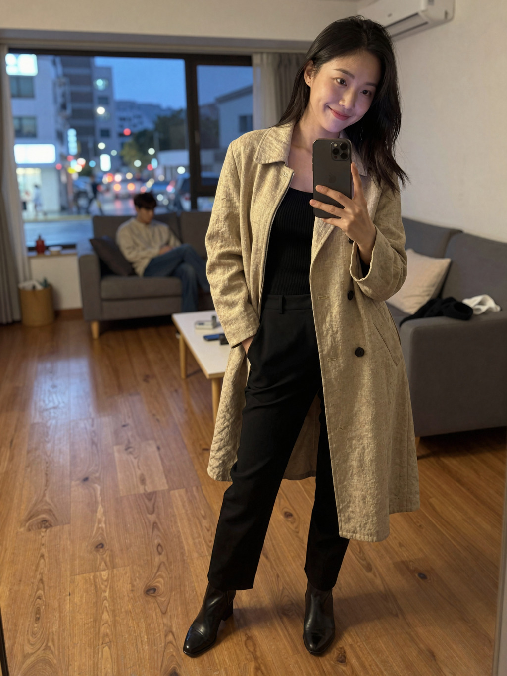 Soft evening mirror selfie in a calm living room