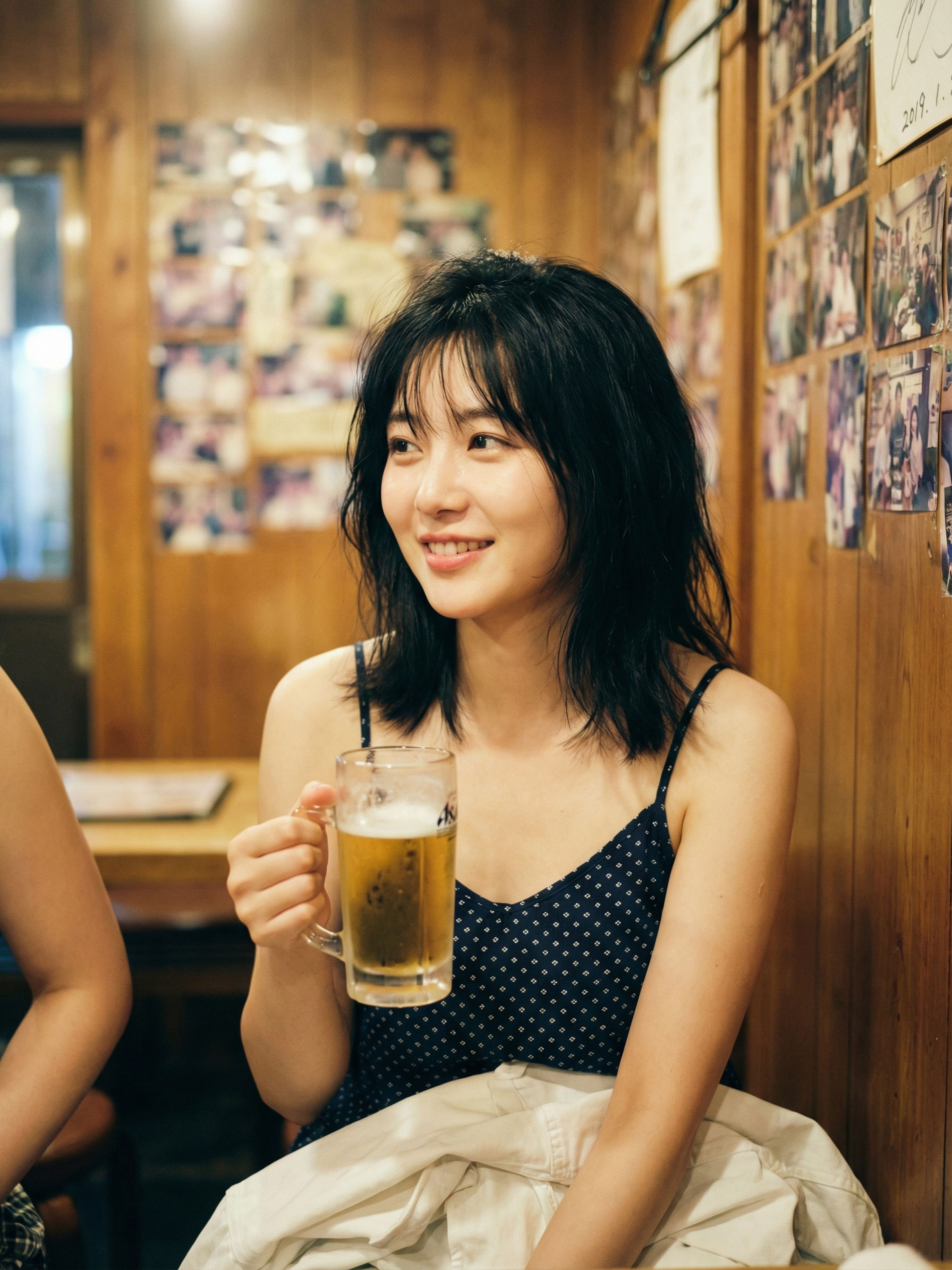 Soft Candid Portrait of a Smiling Woman Holding a Glass Mug