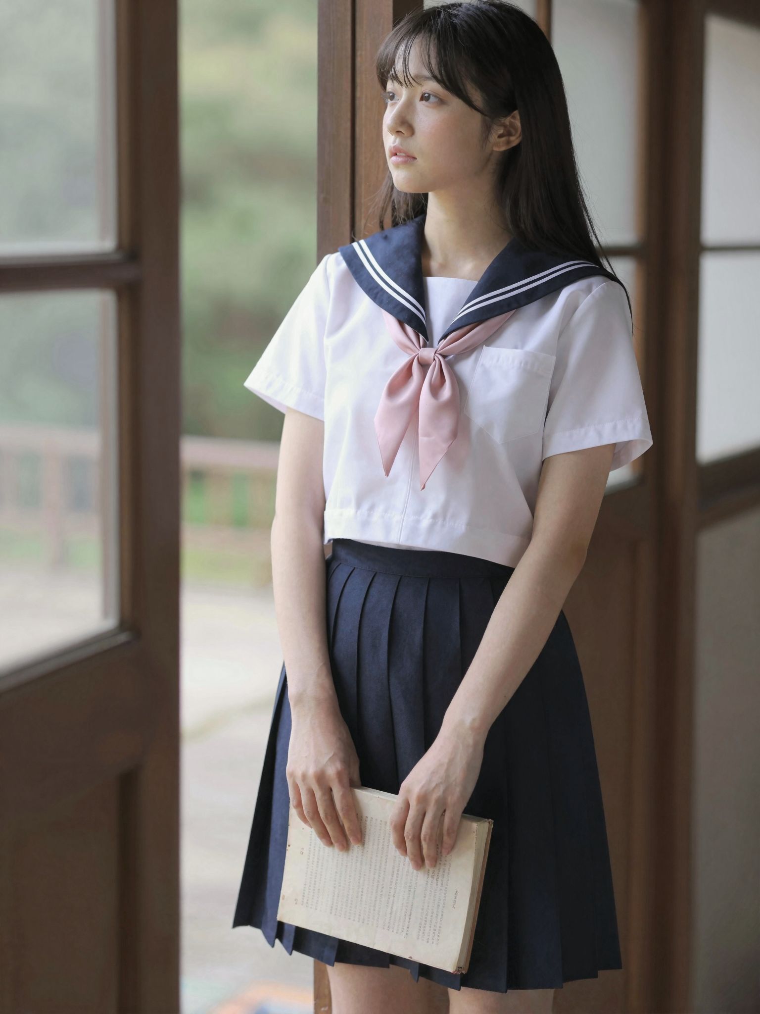 Quiet Gaze by the Window in a Sailor Uniform