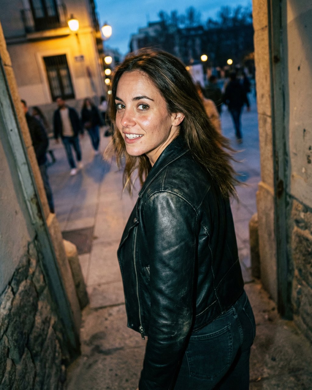 Over-the-Shoulder Smile in a Black Leather Jacket